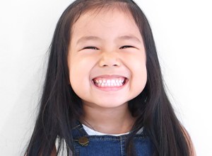 Young girl smiling for camera