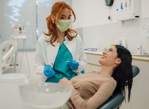 Dentist and patient having a pleasant conversation