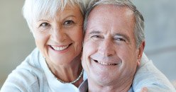 Older man and woman smiling