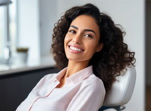 Smiling woman in dental treatment chair