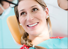 Smiling woman in dental chair