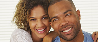 Young couple smiling brightly