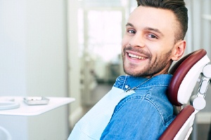 Happy patient at appointment for tooth extraction in Abington