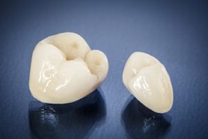 two CEREC crowns in Abington resting on table