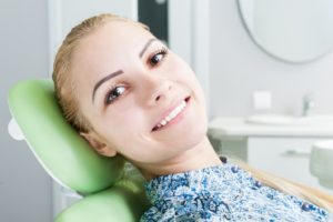 Woman with white teeth in Abington attending dental checkup