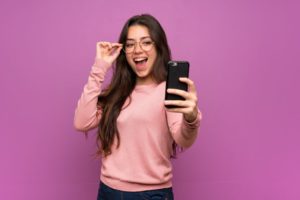 Confident teen girl taking a selfie